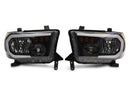 Raxiom 07-13 Toyota Tundra Axial Series Headlights w/ LED Bar- Black Housing (Clear Lens)