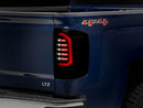 Raxiom 14-18 Chevrolet Silverado 1500 Axial Series LED Tail Lights- Black Housing (Smoked Lens)