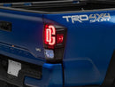 Raxiom 16-23 Toyota Tacoma XW Series Sequential LED Tail Lights- Black Housing- Clear Lens