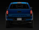 Raxiom 16-23 Toyota Tacoma XW Series Sequential LED Tail Lights- Black Housing- Red Lens