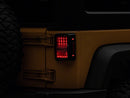 Raxiom 07-18 Jeep Wrangler JK Axial Series Lux LED Tail Lights- Black Housing (Clear Lens)